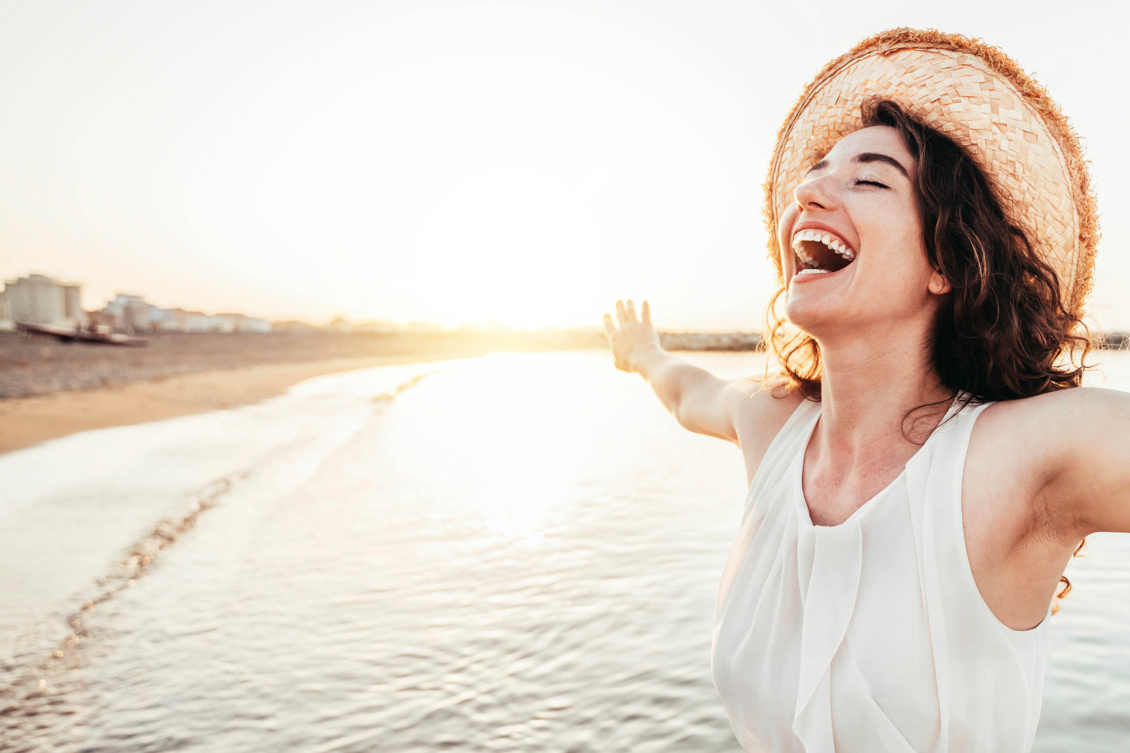 Smiling woman at the beach