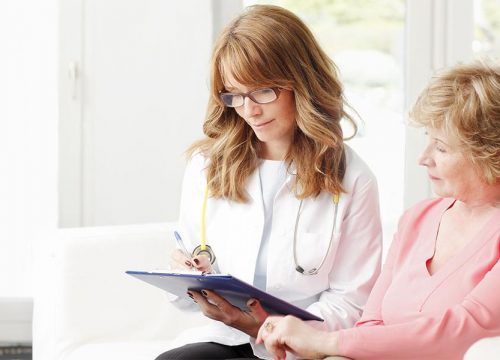 An older woman at a GYN appointment