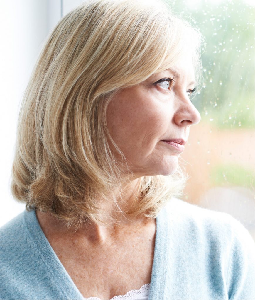 Woman staring out the window