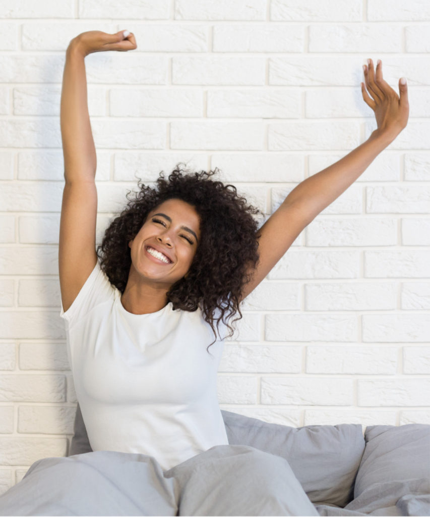 Woman in white shirt stretching