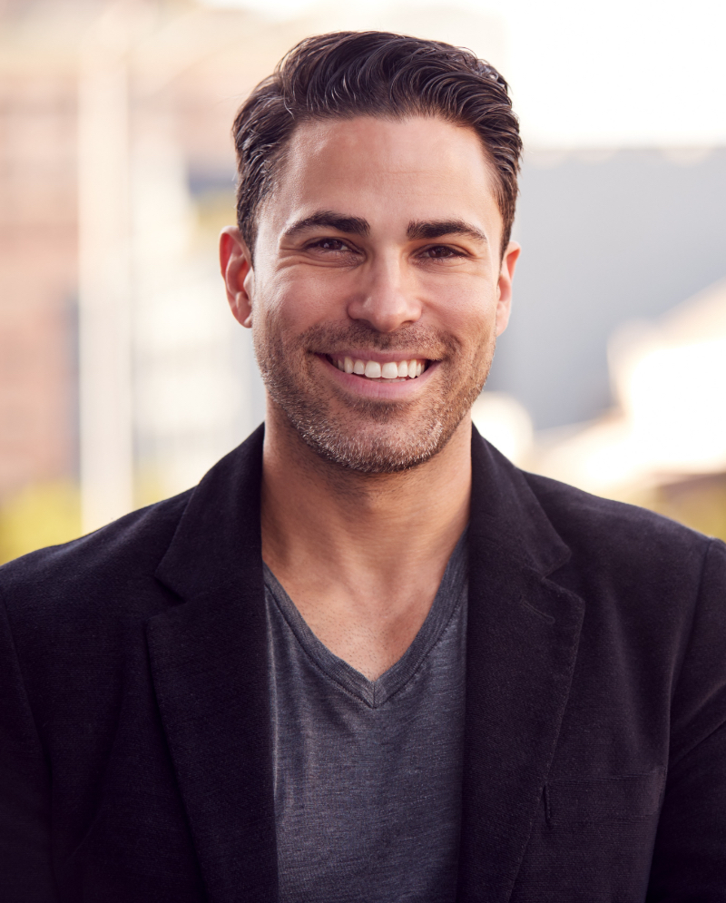 Smiling man wearing a blazer